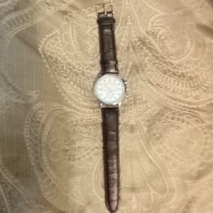 Geneva unisex watch with leather band.